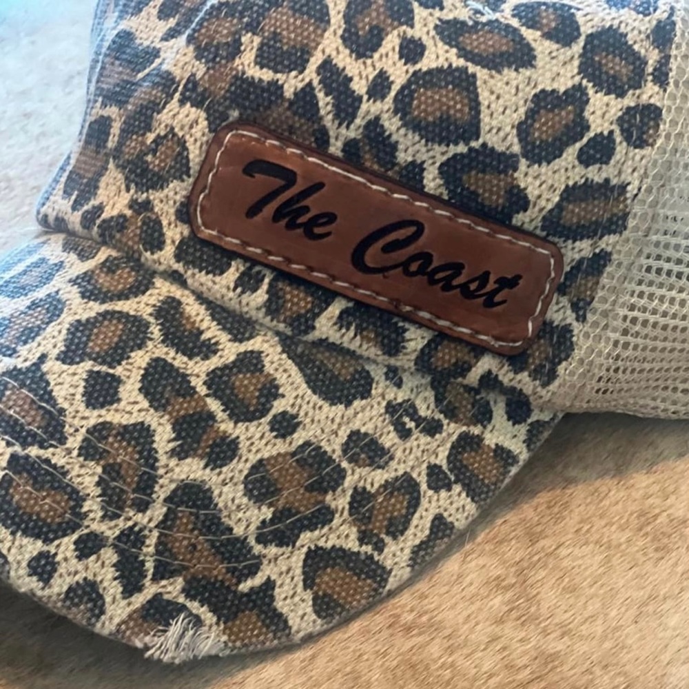 Leopard SnapBack baseball cap with customized leather patch reading “The Coast”